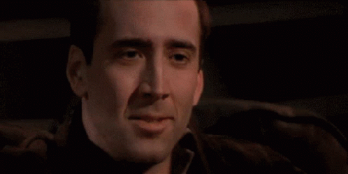 nicholas-cage-funny-laughing-happy-gif-14538106.gif